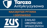 powiększ